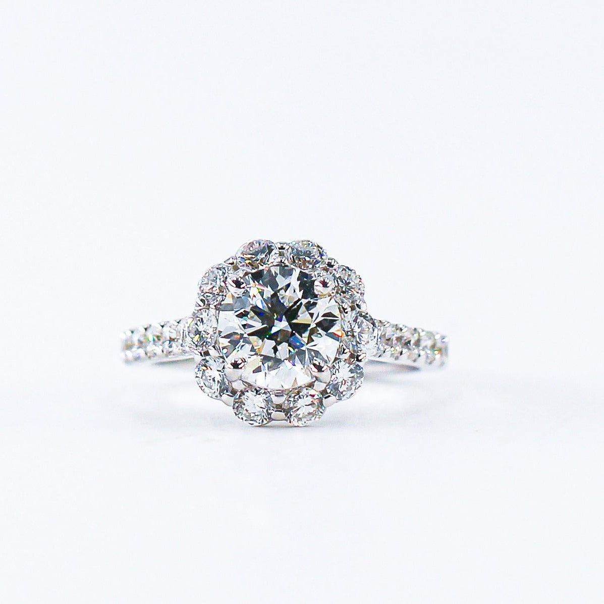 round brilliant cut diamond halo engagement rings  melbourne australia unique design