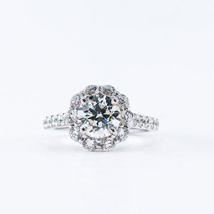 round brilliant cut diamond halo engagement rings  melbourne australia unique design