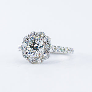 round brilliant cut diamond halo engagement rings  melbourne australia unique design