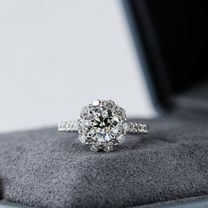 round brilliant cut diamond halo engagement rings  melbourne australia unique design