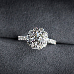 round brilliant cut diamond halo engagement rings  melbourne australia unique design
