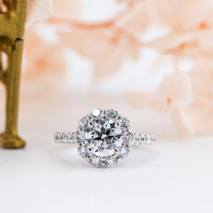 round brilliant cut diamond halo engagement rings  melbourne australia unique design