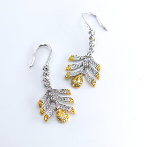 Pear shaped Fancy intense yellow diamond earrings sydney in stock