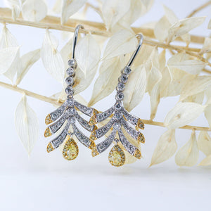 Pear shaped Fancy intense yellow diamond earrings sydney in stock