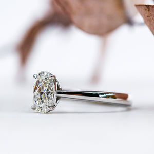 Oval Cut Solitaire Diamond Engagement Ring with Four Claws in Reversed Tapered Shank Style - OVSOR06
