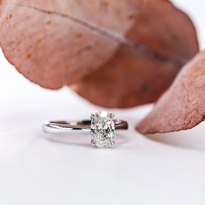 Oval Cut Solitaire Diamond Engagement Ring with Four Claws in Reversed Tapered Shank Style - OVSOR06