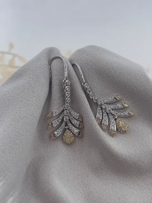 Pear shaped Fancy intense yellow diamond earrings sydney in stock