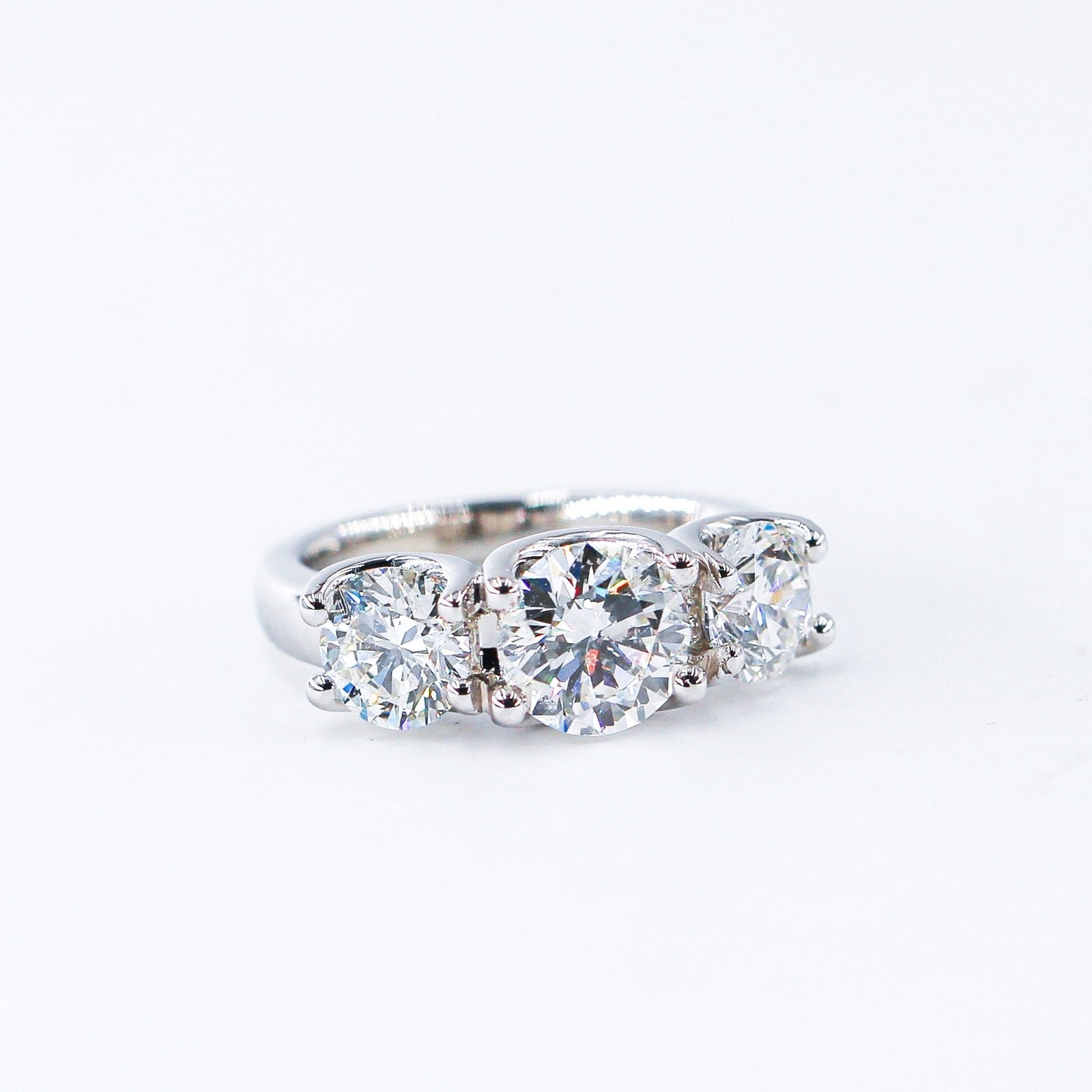 round brilliant cut diamond three stone engagement rings melbourne best price
