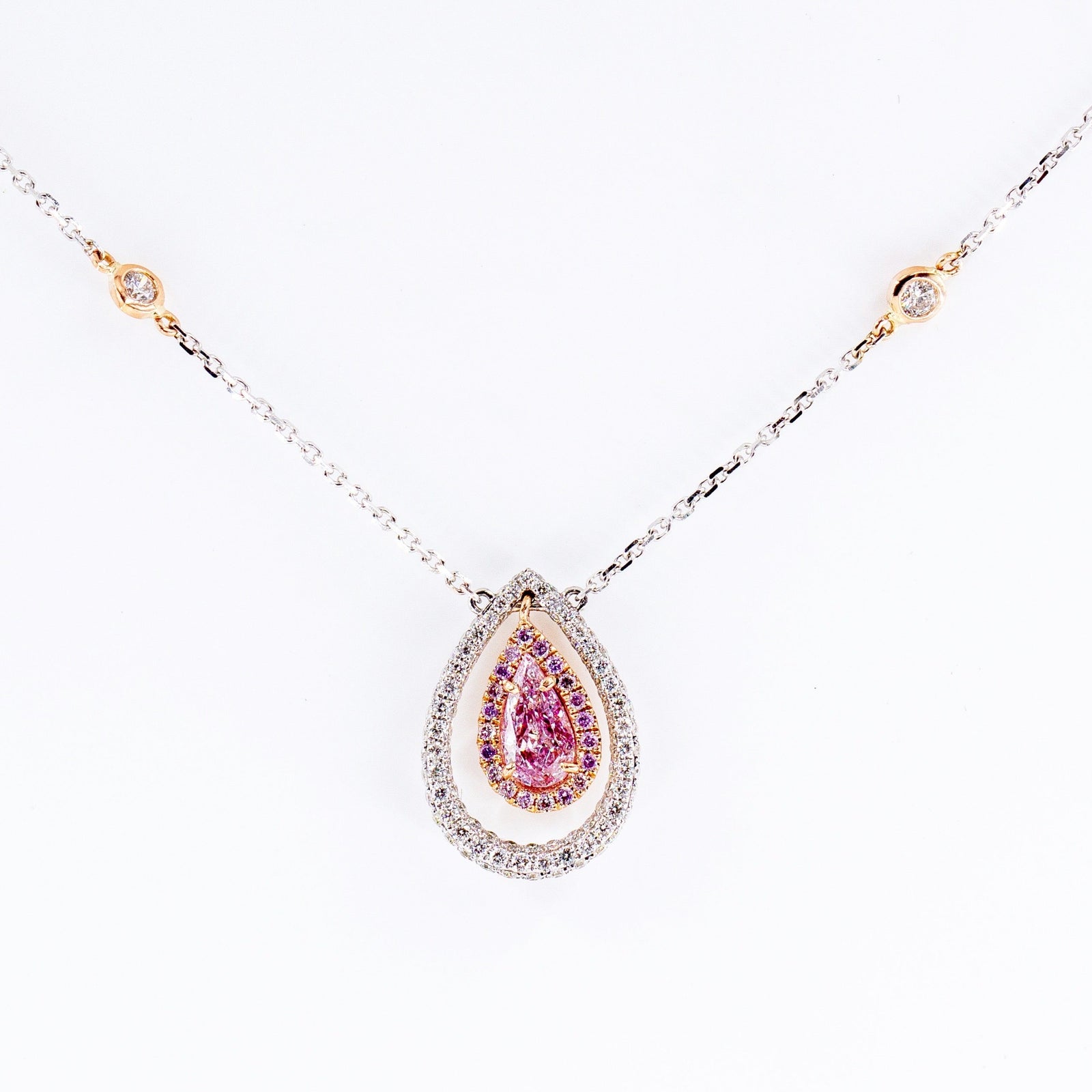 Pear shaped argyle pink diamond halo pendants Melbourne Exclusive deals