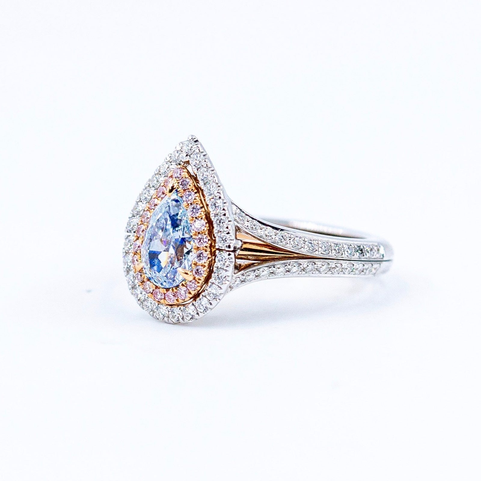Pear shape fancy intense blue diamond halo rings melbourne for sale