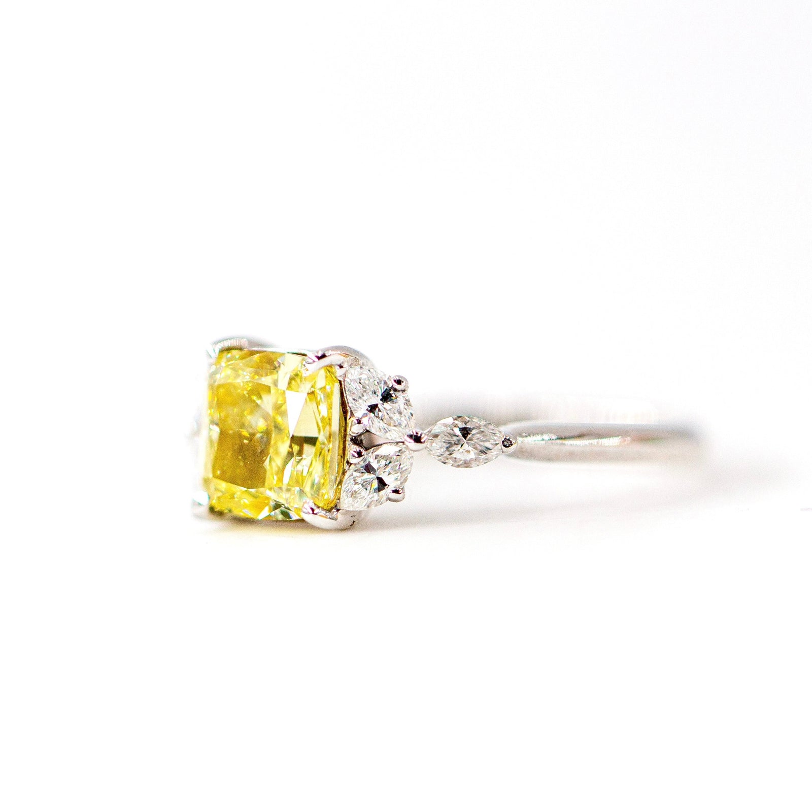 Cushion cut fancy yellow diamond side stone rings sydney best price