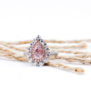 Pear shaped Fancy intense pink  diamond halo rings  sydney smart investment