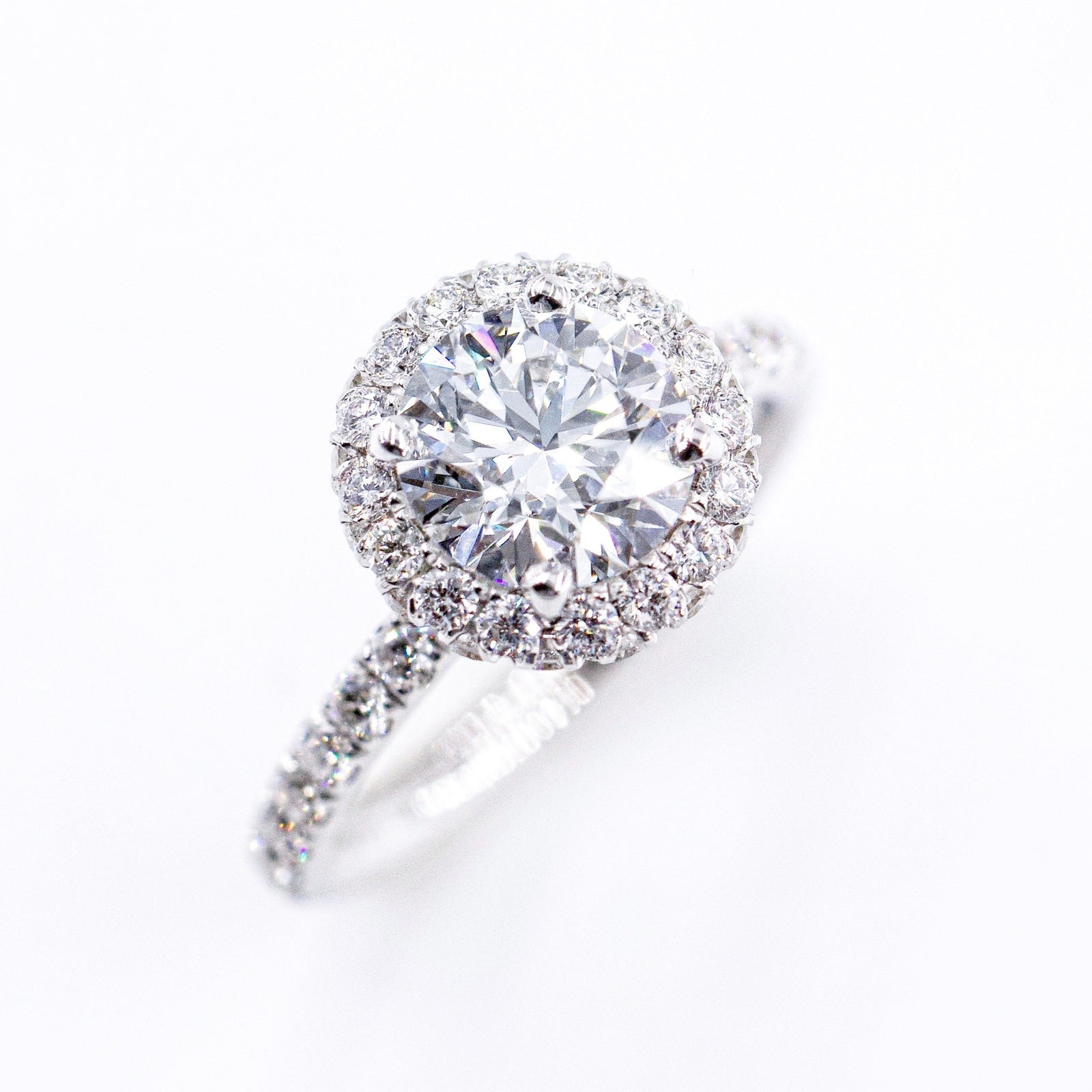 round brilliant cut diamond halo engagement rings melbourne unique design