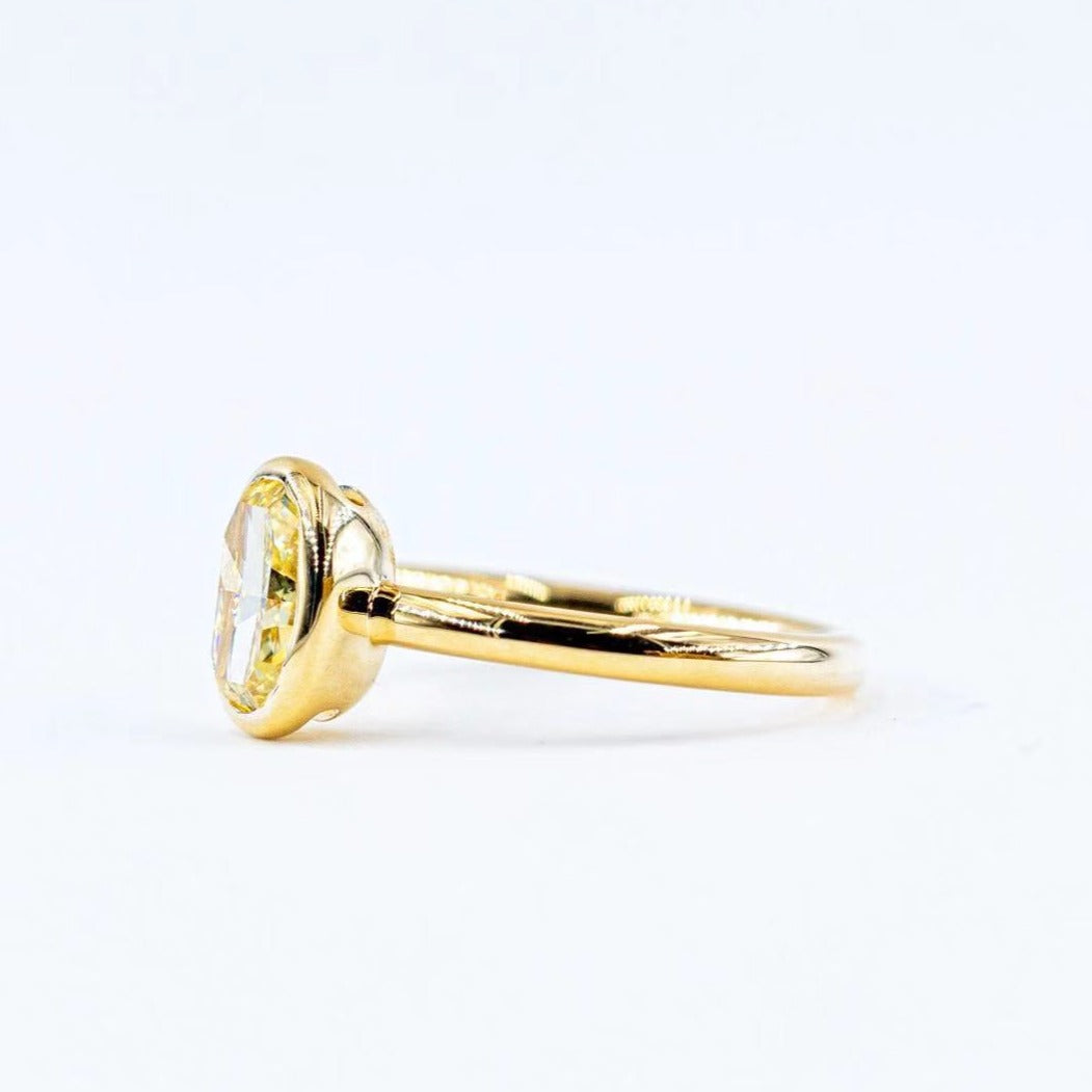 Oval cut Fancy yellow diamond solitaire rings Melbourne best value
